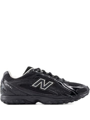 Baskets blanches à panneaux New Balance 1906R 